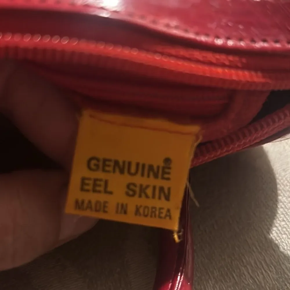 Vintage red eel skin barrel bag